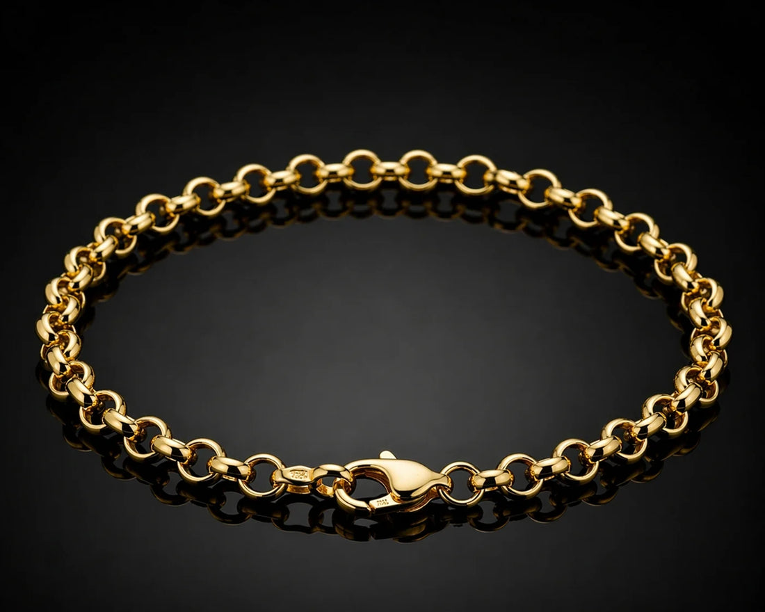 Gold chain held in a hand