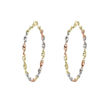 Pair of gold, silver, and rose gold hoop earrings on a white background