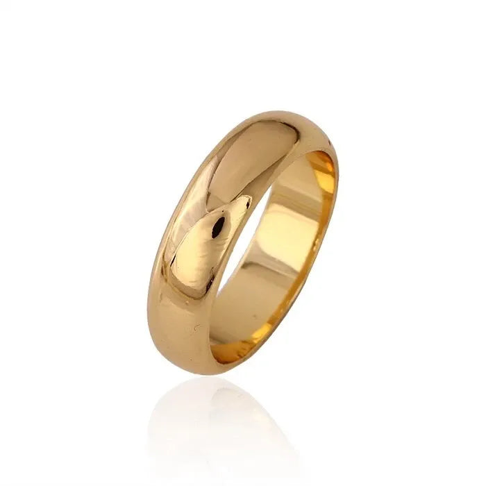 Gold ring on a white background