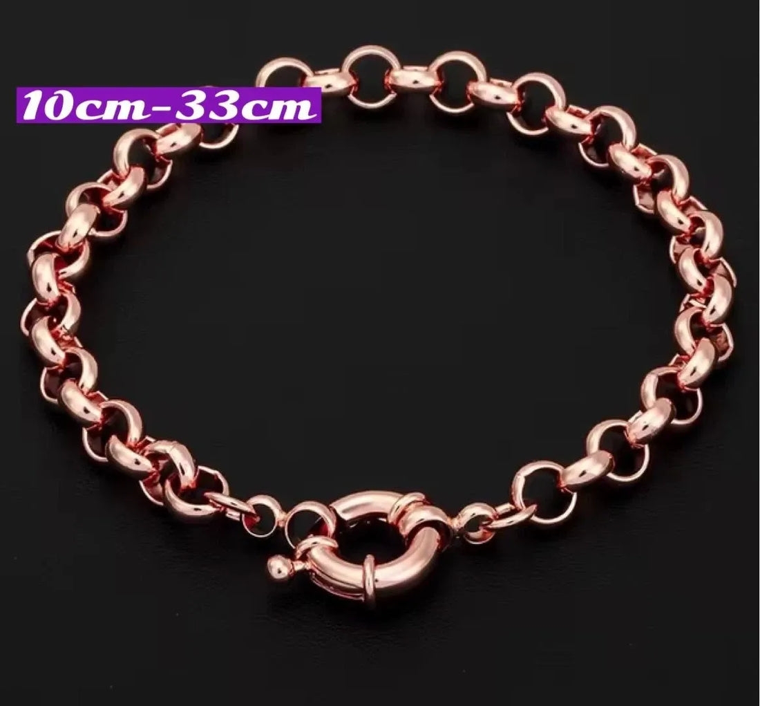 Rose gold chain bracelet on a black background with size indication.
