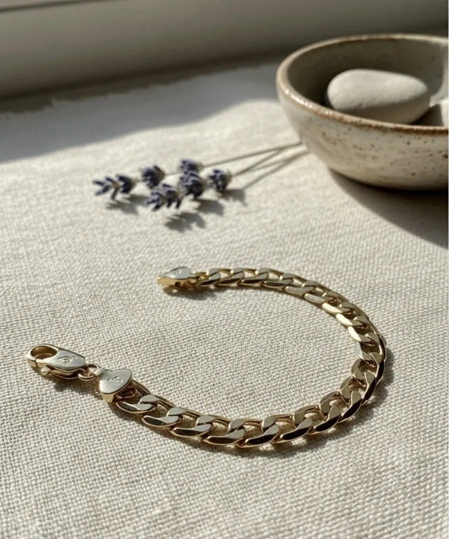  18k Yellow Gold Plated men's bracelet on black pillow