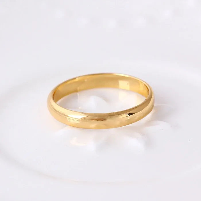 Minimalist gold wedding band UK jewellery