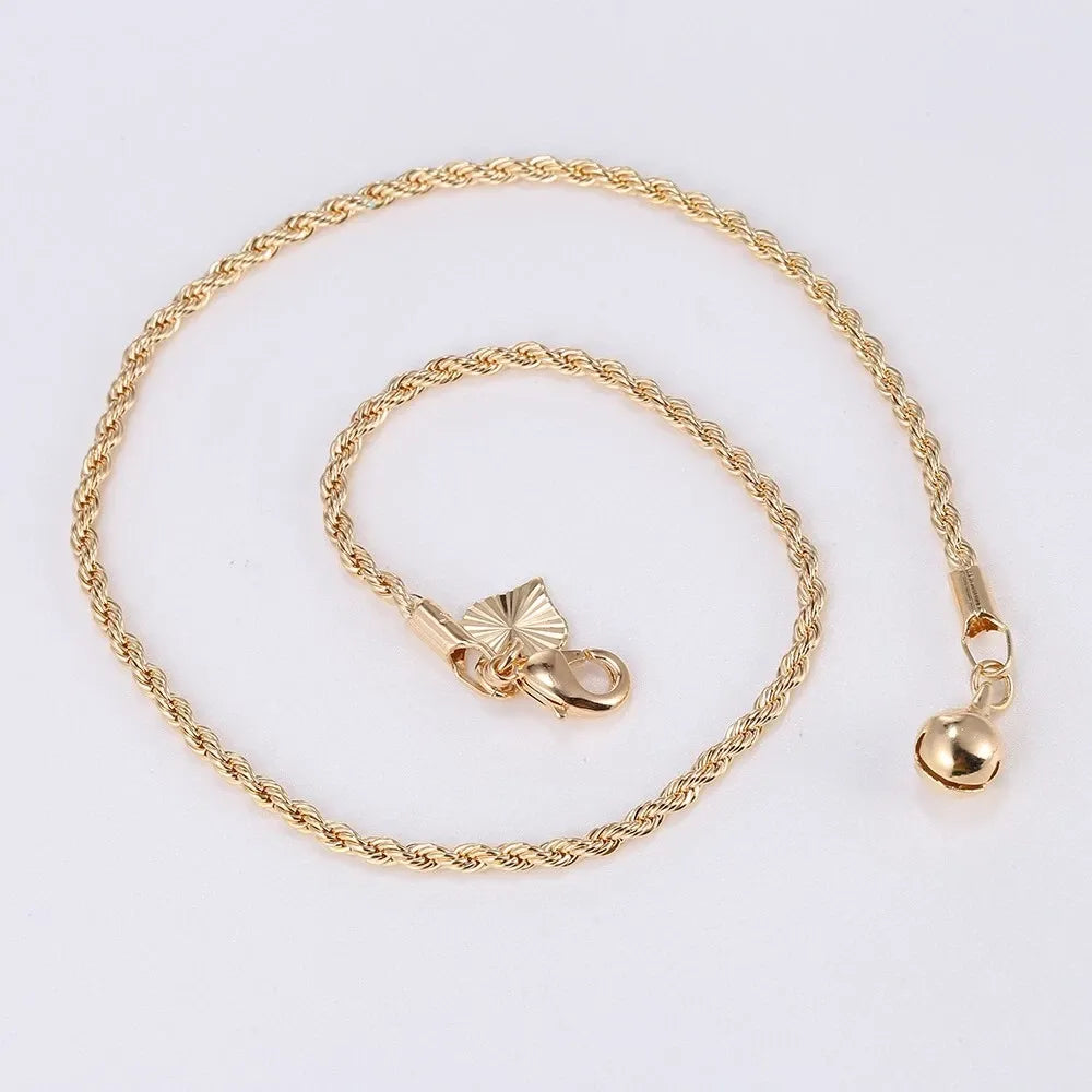 Gold chain bracelet with a clasp on a white background