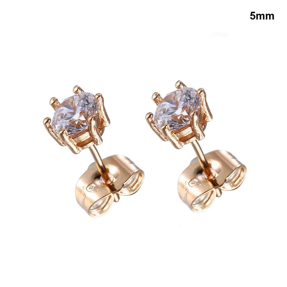 Rose gold stud earrings with clear gemstones on a white background