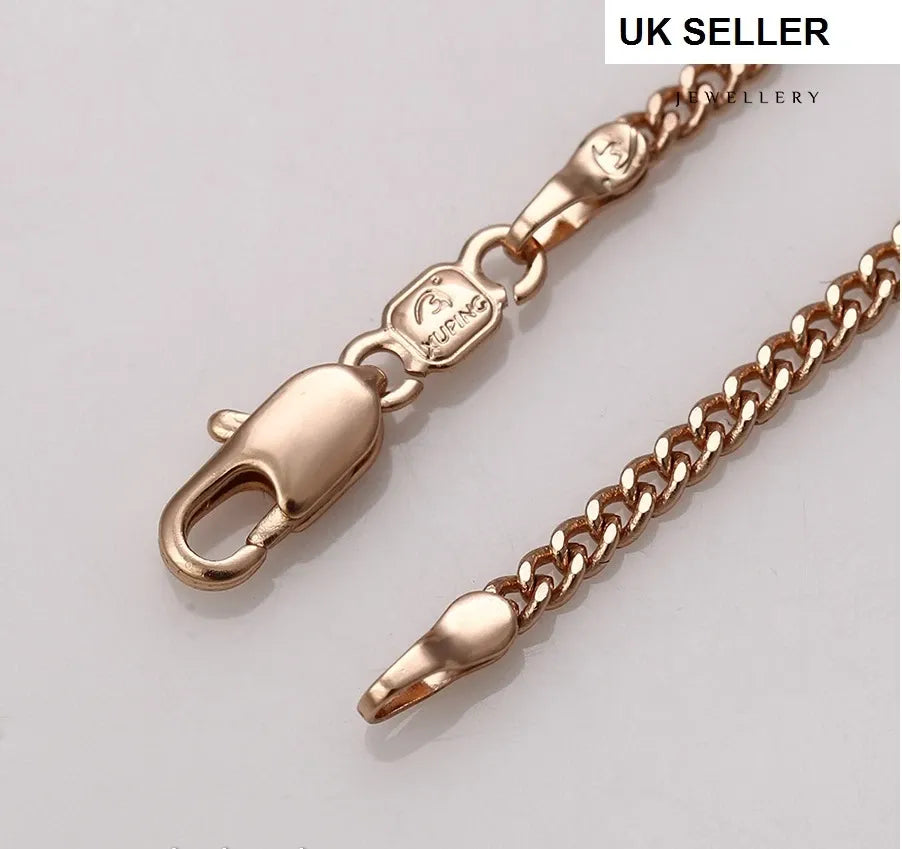 Rose gold chain with clasp on a light gray background, branded 'UK SELLER'.
