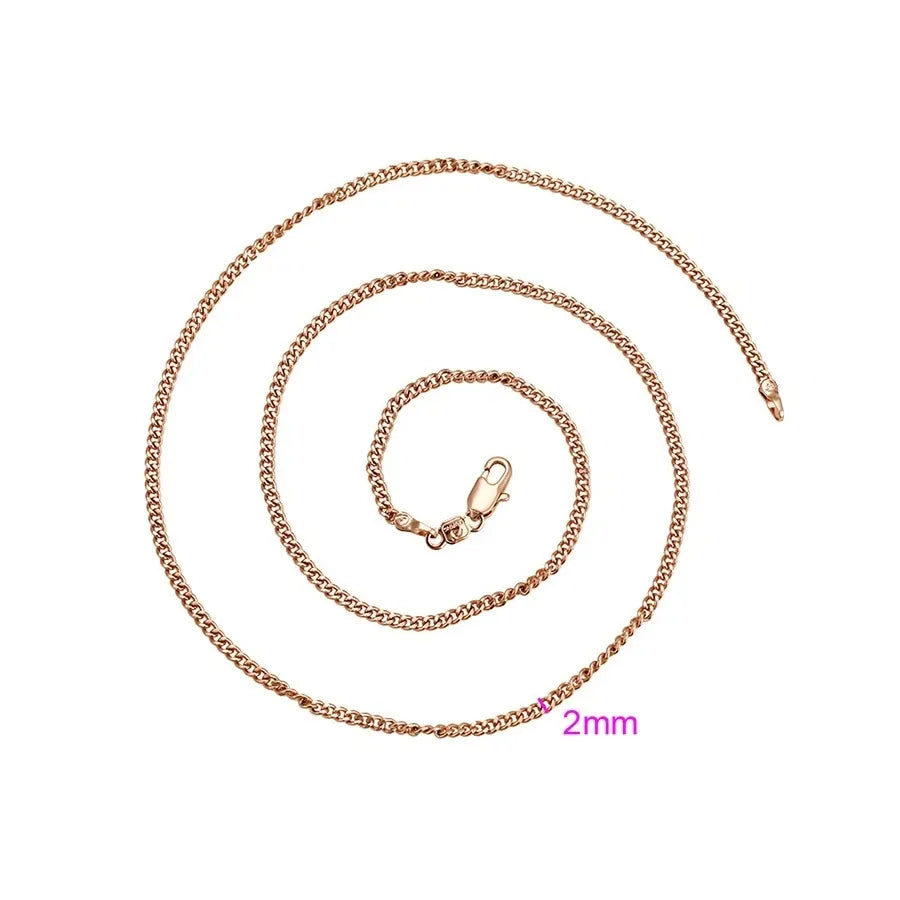 Rose gold chain necklace on a white background