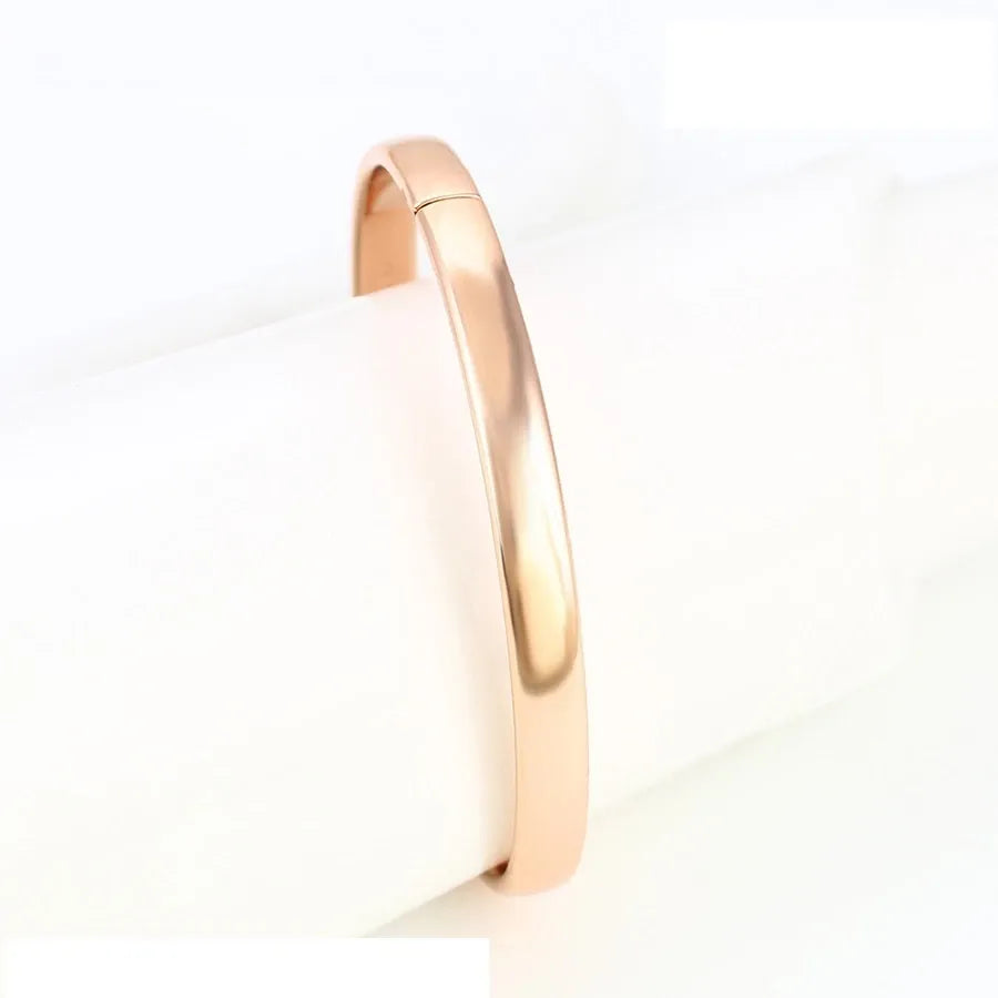 Rose gold bracelet on a white background