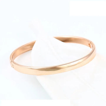 Rose gold bracelet on a white background