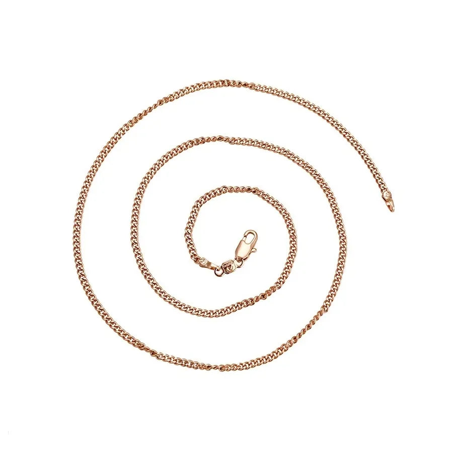 Rose gold chain necklace on a white background