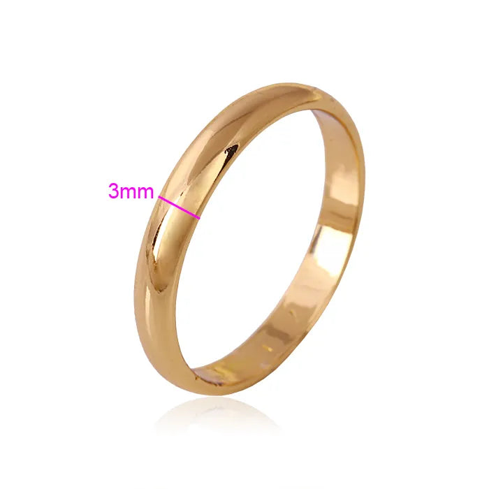 Gold ring with a 3mm width measurement line on a white background