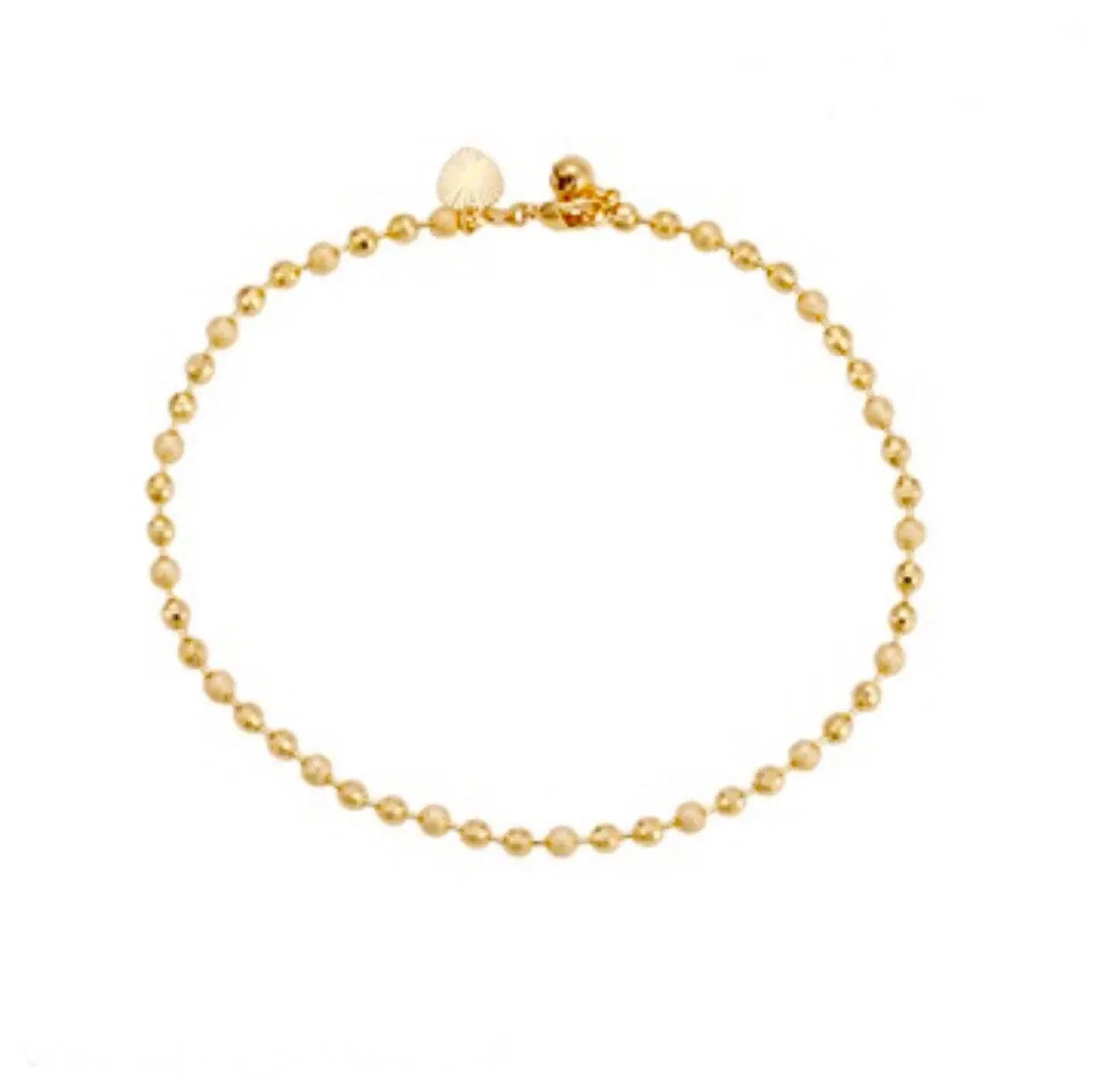 Gold beaded bracelet on a white background