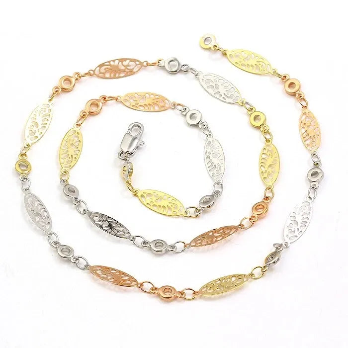 Tri-color gold chain necklace on a white background