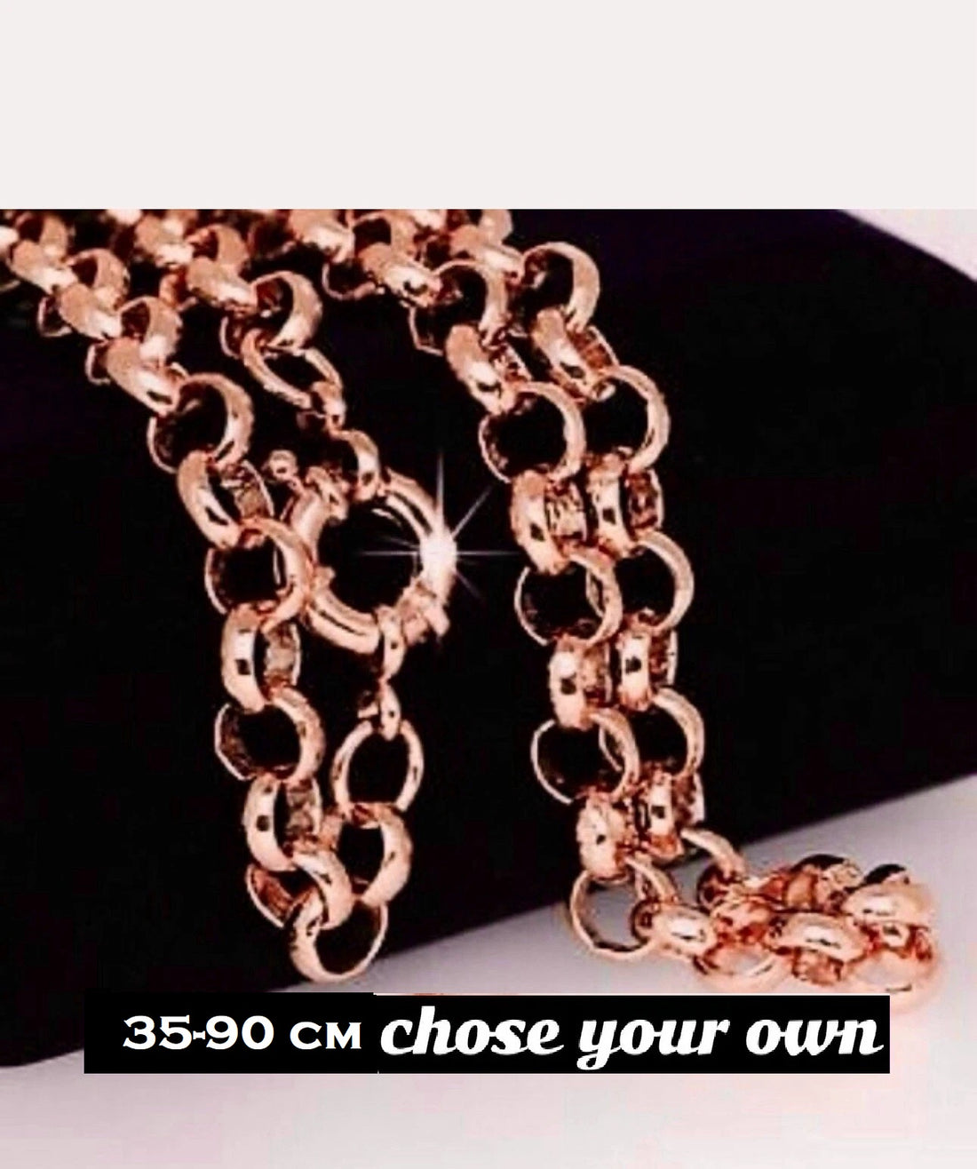 Rose gold chain necklace on a dark background with text '35.90 cm chose your own'.
