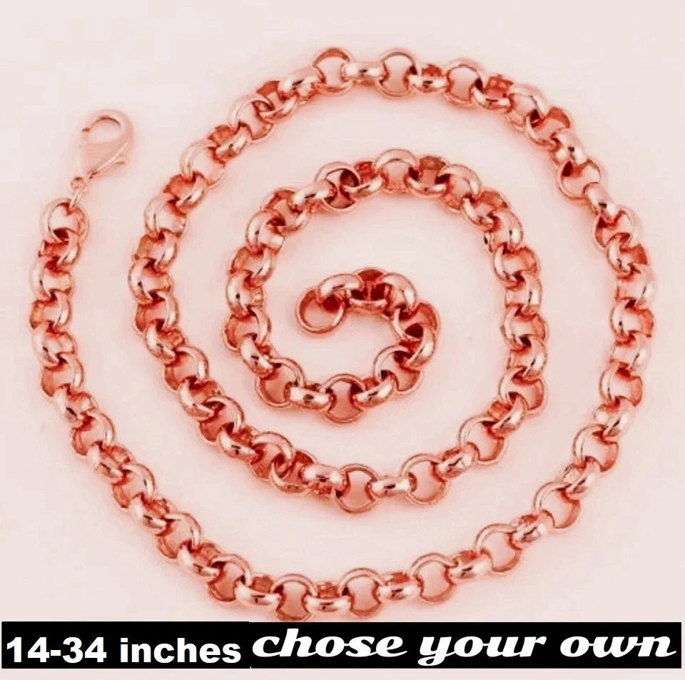 Rose gold chain on a light pink background