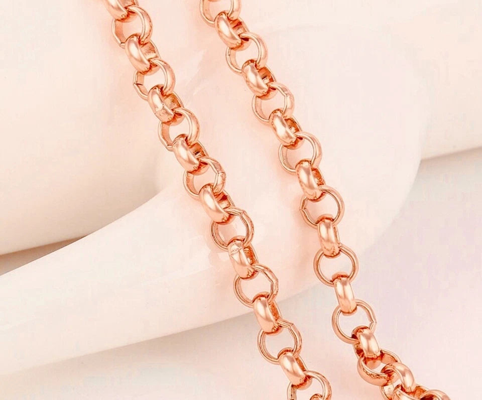Rose gold chain necklace on a dark background with text '35.90 cm chose your own'.